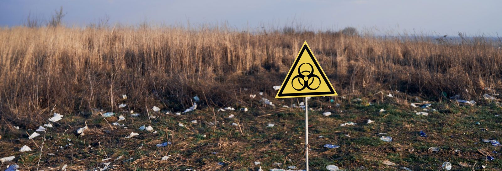 Waste ground with biohazard sign banner image
